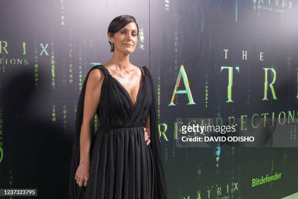 Canadian actress Carrie-Anne Moss arrives for the premiere of "The Matrix Resurrections" at the Castro Theatre in San Francisco, California, December...