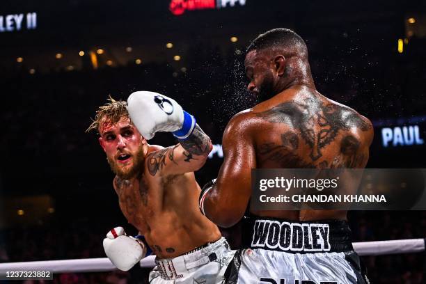 LYouTube personality Jake Paul and former UFC welterweight champion Tyron Woodley fight at the Amalie Arena in Tampa, Florida, on December 18, 2021.
