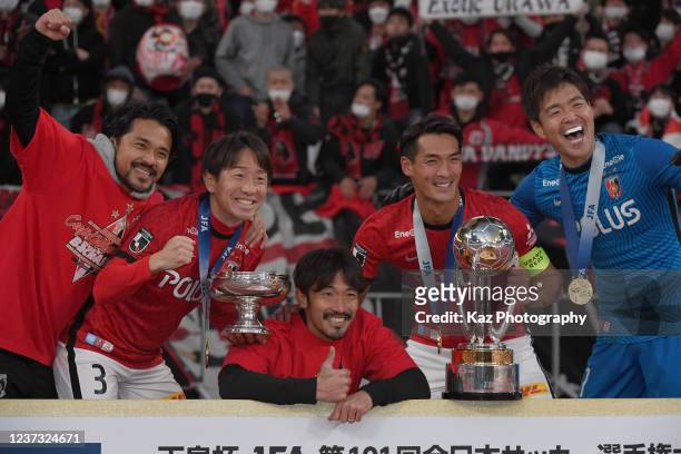 Tomoya Ugajin, Tomoaki Makino, Yuki Abe, Shusaku Nishikawa and Shinzo Koroki of Urawa Red Diamonds pose with Emperor's Cup during the 101st Emperor's...