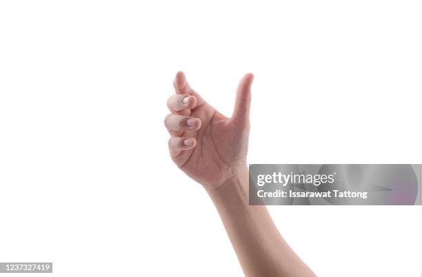 woman's hands holding something empty  isolated on white background. - bottle stockfoto's en -beelden