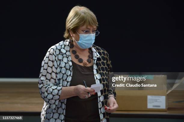 Former President of Chile and UN High Commissioner for Human Rights Michelle Bachelet votes during presidential elections on December 19, 2021 in...