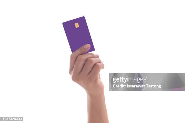 hand holding credit card isolated on white - mano umana foto e immagini stock