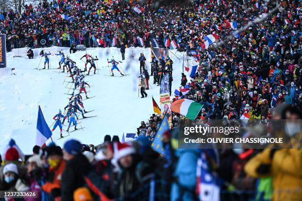 Athletes compete during the Mens 15 km Mass Start event of the IBU Biathlon World Cup in Le Grand Bornand near Annecy on December 19, 2021.