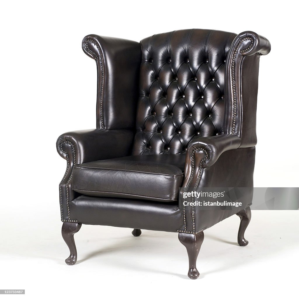 Antique brown leather armchair