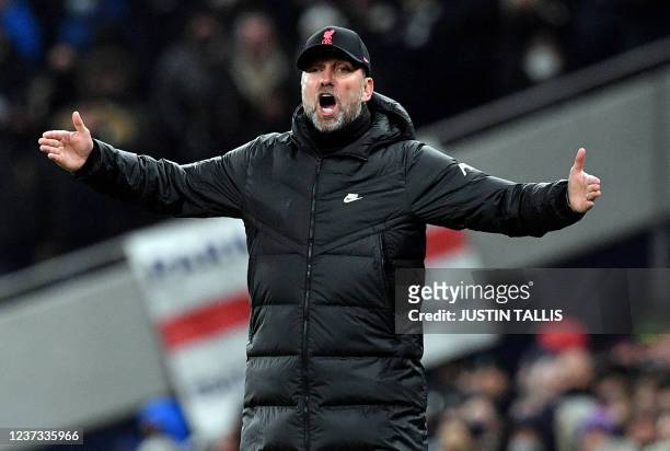Liverpool's German manager Jurgen Klopp reacts during the English Premier League football match between Tottenham Hotspur and Liverpool at Tottenham...