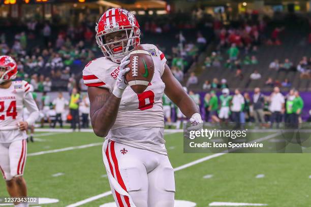 Louisiana-Lafayette Ragin Cajuns linebacker Kris Moncrief celebrates a fumble recovery during the R+L Carriers New Orleans Bowl between the...