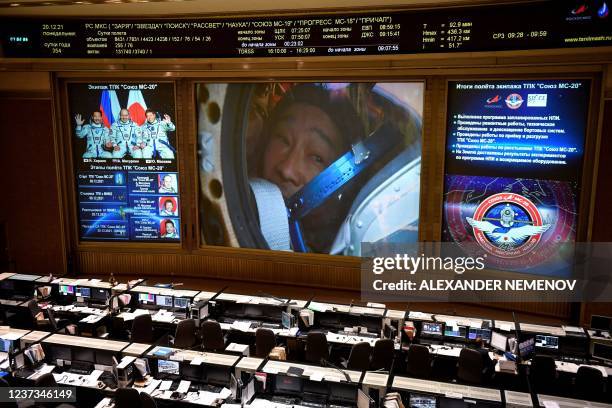 Screen shows broadcast from the landing site of the Soyuz MS-20 capsule carrying the International Space Station crew of Roscosmos cosmonaut...