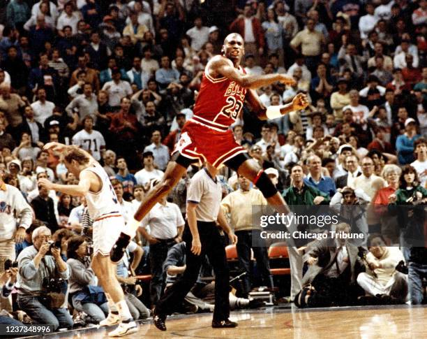 Michael Jordan reacts after hitting the game-winning basket over Cleveland&apos;s Craig Ehlo in Game 5 of the NBA playoffs on May 7, 1989.