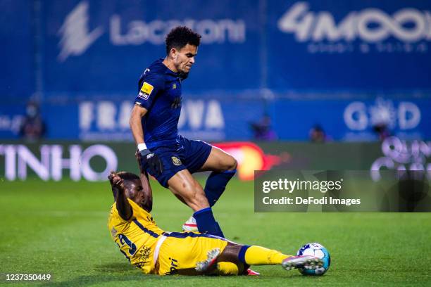 Luis Diaz of FC Porto and Koffi Kouao of FC Vizela battle for the ball during the Liga Portugal Bwin match between FC Vizela and FC Porto at the...