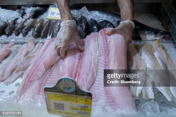 Pirarucu fish for sale at the Zona Sul grocery store in Rio de Janeiro, Brazil, on Friday, Dec. 17, 2021. As extended families the world over plan...