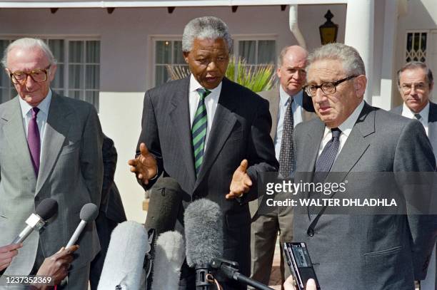 African National Congress President Nelson Mandela speaks during a press conference with former US Secretary of State Henry Kissinger and former...