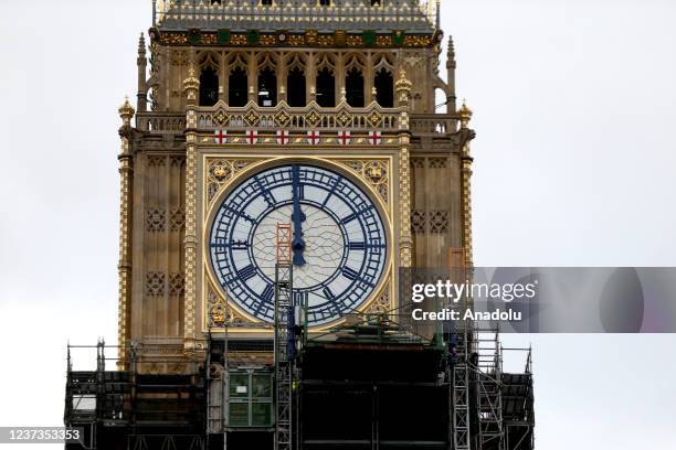 Workers remove sections of scaffolding surrounding Elizabeth Tower, commonly known as Big Ben, as renovation works continue in London, United Kingdom...