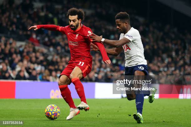 Mohamed Salah of Liverpool in action with Ryan Sessegnon of Tottenham Hotspur during the Premier League match between Tottenham Hotspur and Liverpool...