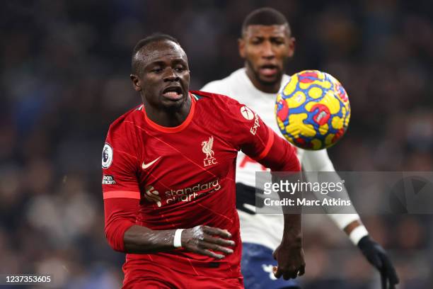 Sadio Mane of Liverpool in action with Emerson Royal of Tottenham Hotspur during the Premier League match between Tottenham Hotspur and Liverpool at...