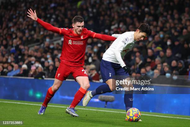 Son Heung-min of Tottenham Hotspur in action with Andrew Robertson of Liverpool during the Premier League match between Tottenham Hotspur and...