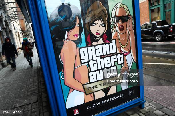 Grand Theft Auto The Trilogy video game ad is seen on a tram stop in Krakow, Poland on December 19, 2021.