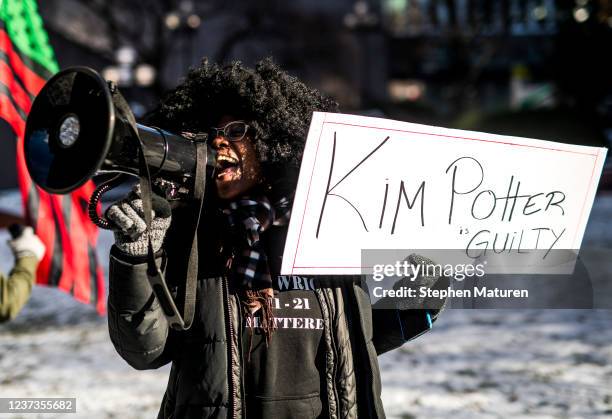 Ashley Dorelus demonstrates in support of Daunte Wrights family outside the Hennepin County Government Center on December 20, 2021 in Minneapolis,...