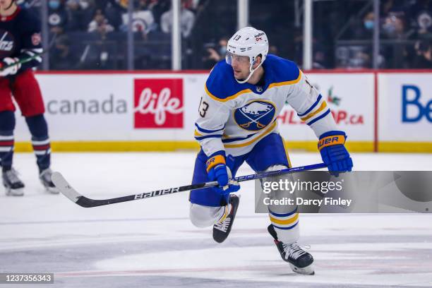 Mark Pysyk of the Buffalo Sabres follows the play up the ice during first period action against the Winnipeg Jets at Canada Life Centre on December...