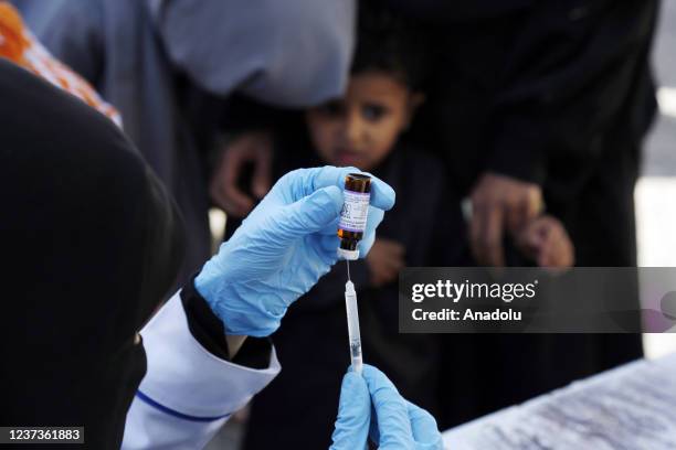 Yemeni children receive doses of vaccines against measles and polio as part of vaccine campaign launched with the support of United Nations...