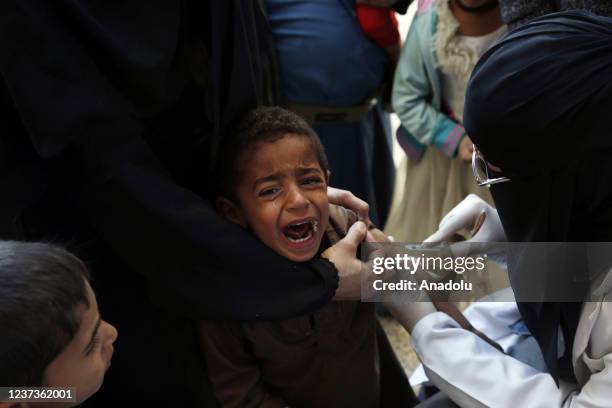 Yemeni children receive doses of vaccines against measles and polio as part of vaccine campaign launched with the support of United Nations...