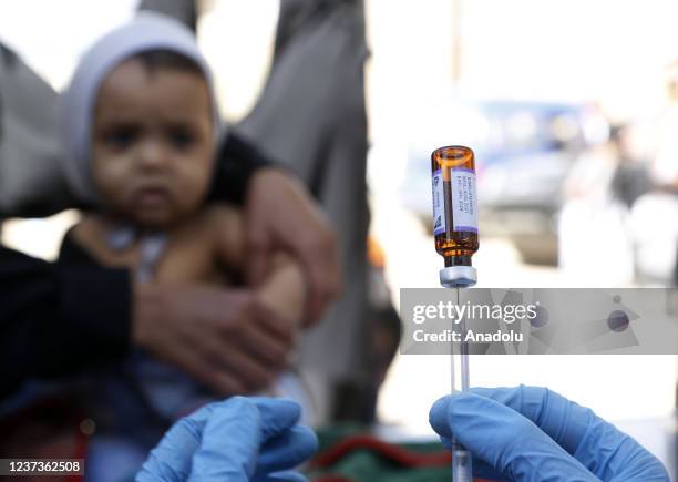 Yemeni children receive doses of vaccines against measles and polio as part of vaccine campaign launched with the support of United Nations...