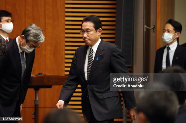 Japanese Prime Minister Fumio Kishida arrives to hold a press conference at Prime Minister's official residence in Tokyo, Japan after an...