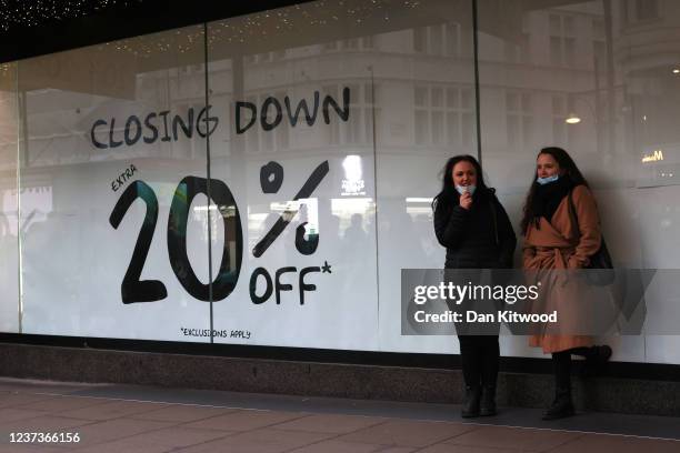 Shoppers stand outside House of Fraser on Bond Street during the store's closing down sale on December 21, 2021 in London, England. UK Chancellor of...