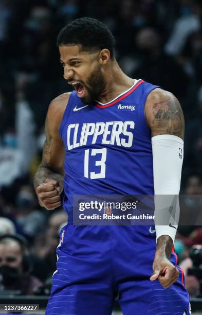 Los Angeles, CA, Monday, December 20, 2021 - LA Clippers guard Paul George celebrates after making a long three point shot in the first half against...