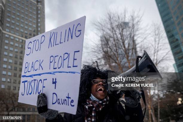 Ashley Dorelus demonstrates outside the Hennepin County Government Center in Minneapolis, Minnesota, on December 21 during jury deliberations in the...