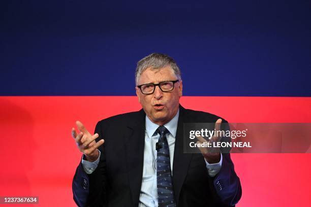 Microsoft founder-turned-philanthropist Bill Gates delivers a speech during the Global Investment Summit at the Science Museum in London on October...