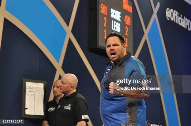 London, England, : Adrian Lewis celebrates in the match against Matthew Campbell during the PDC William Hill World Darts Championship at Alexandra...