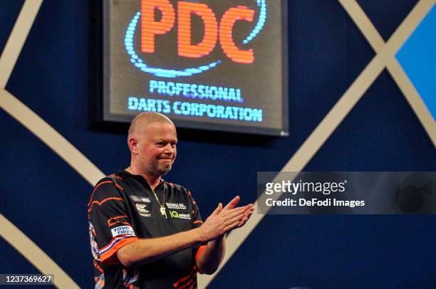 London, England, : Raymond van Barneveld looks on in the match against Lourence Ilagan during the PDC William Hill World Darts Championship at...
