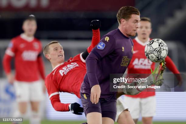 Albert Gudmundsson of AZ Alkmaar, Wessel Dammers of FC Groningen during the Dutch Eredivisie match between AZ Alkmaar v FC Groningen at the AFAS...