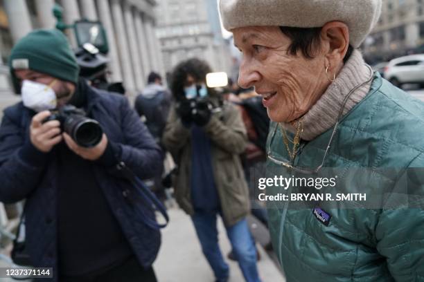 Isabelle Maxwell, sister of Ghislaine Maxwell, is surrounded by reporters as she arrives at the US Court House in New York on December 21 as a jury...
