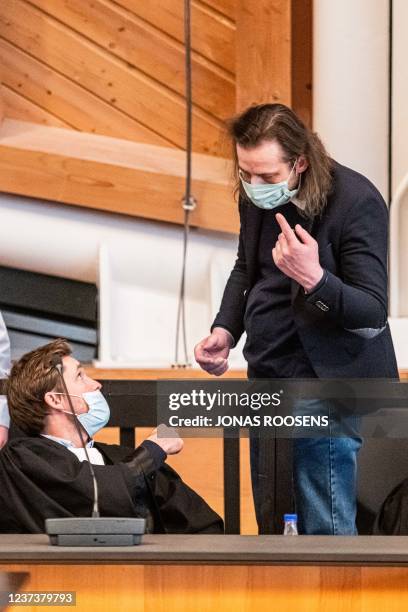 The accused Steve Bakelmans talks to his lawyer Dimitri De Beco after receiving a life long imprisonment sentence at the verdict session of the...