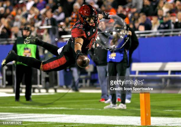 San Diego State Aztecs wide receiver Jesse Matthews dives into the end zone for a touchdown during the Tropical Smoothie Cafe Frisco Bowl game...