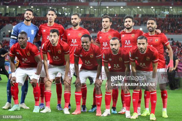 Ahly's players pose for a group picture ahead of the CAF Super Cup football match between Egypt's Al-Ahly and Morocco's Raja Club Athletic at the...