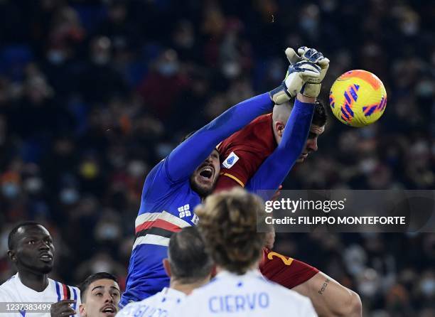 Sampdoria's Italian goalkeeper Wladimiro Falcone deflects a shot under threat from Roma's Italian defender Gianluca Mancini during the Italian Serie...