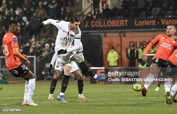 Paris Saint-Germain's Argentinian forward Mauro Icardi kicks to score his team's first goal during the French L1 football match between FC Lorient...