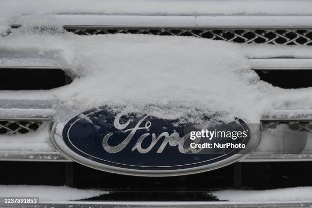 Ford logo seen on a Ford car parked in downtown Edmonton. On Wednesday, December 22 in Edmonton, Alberta, Canada.