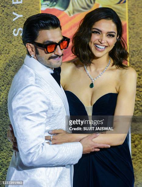 In this picture taken on December 22 Bollywood actors Ranveer Singh and Deepika Padukone pose during the premiere of the movie '83' in Mumbai.