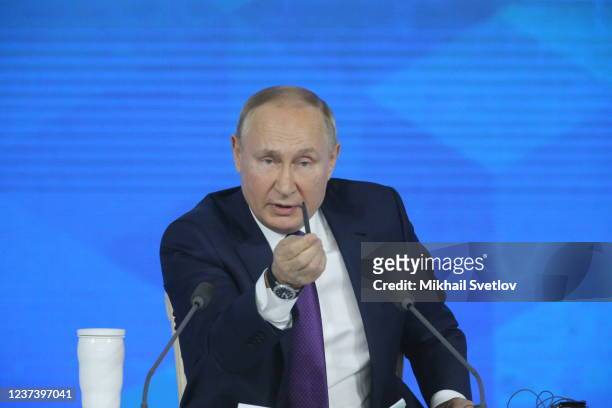 Russian President Vladimir Putin speaks during his annual press conference at the Moscow Manege, on December 23 in Moscow, Russia. More than 500...