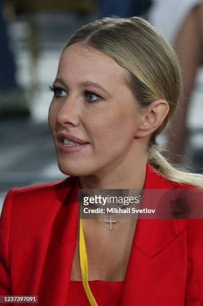 Russian journalist and former candidate for Presidential Elections Ksenia Sobchak smiles during Vladimir Putin's annual press conference at the...