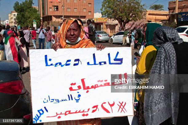 Sudanese women take part in a protest decrying sexual attacks, after the UN said at least 13 women and girls were raped in the recent mass protests...