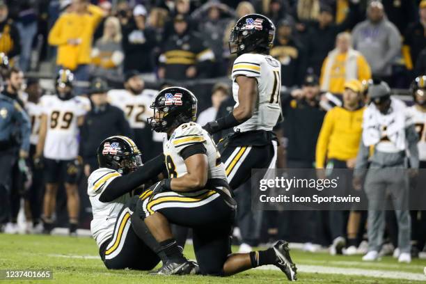 Missouri Tigers players after a loss in the Lockheed Martin Armed Forces Bowl between the Missouri Tigers and the Army Black Knights at Amon G....