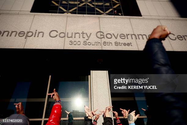 Demonstrators protest outside the Hennepin County Government Center in Minneapolis, Minnesota, on December 23 after the verdict in the trial of...