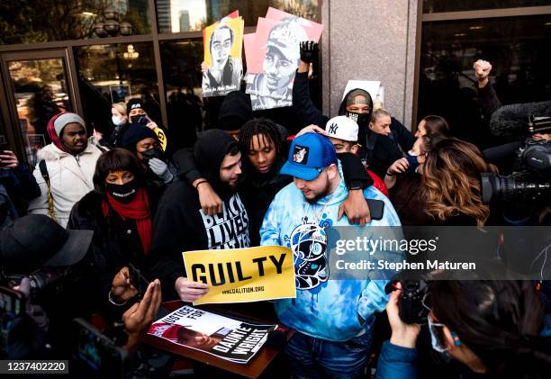 Dallas Bryant , Emajay Driver , and Damik Wright , react after the verdict was read in the trial of Kim Potter on December 23, 2021 in Minneapolis,...