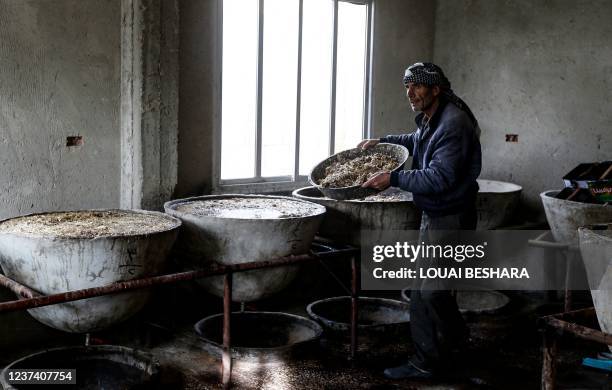 Bassam Debbas, one of the 20 remaining Christian residents of the central Syrian town of al-Qaryatain in the Homs province after his family fled when...