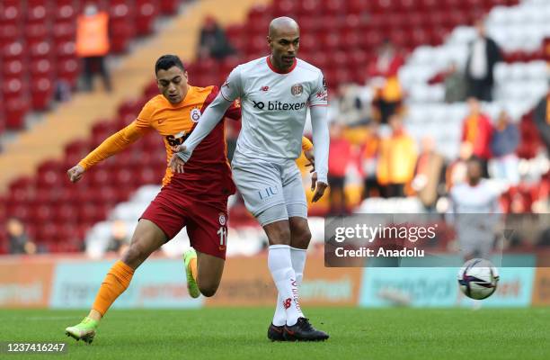 Mostafa Mohamed of Galatasay in action against Edinaldo Pereira of Fraport TAV Antalyaspor during Turkish Super Lig match between Galatasaray and...