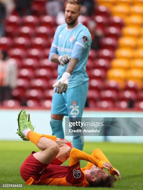 Kerem Akturkoglu of Galatasay gets injured during Turkish Super Lig match between Galatasaray and Fraport TAV Antalyaspor at Nef Stadium in Istanbul,...